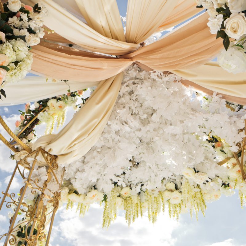 Clothes twined under the top of wedding altar Clothes twined under the top of wedding altar